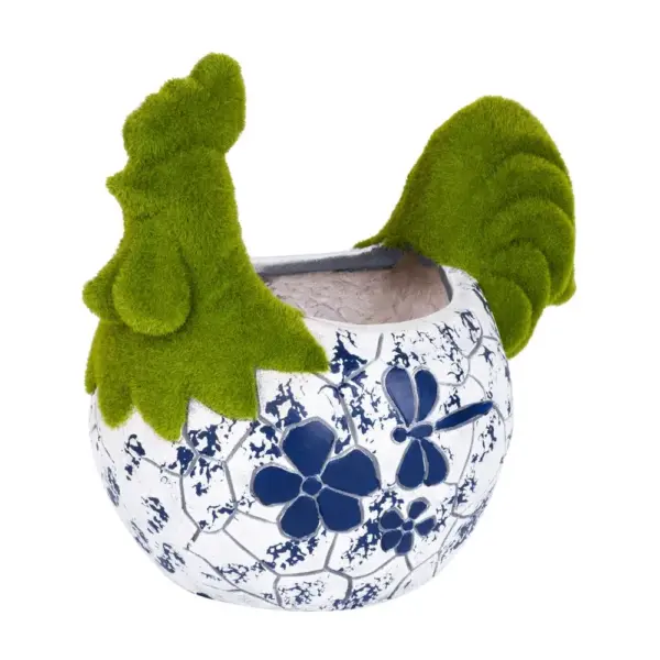<p>Dodajte svojej záhrade eleganciu a neošúchanosť ! Záhradná keramická dekorácia Kohútika s modrým ornamentom a poťahom imitácie trávy určite skrášli každý vonkajší priestor. Do dekorácie si posaďte svoj oľúbený kvet. Rozmery: 34