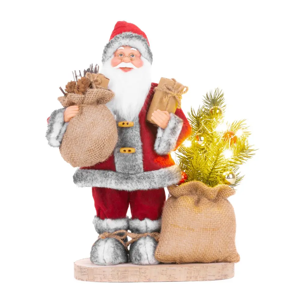 Dekorácia MagicHome Santa s taškou a stromčekom je vkusným doplnkom vášho interiéru počas vianočných sviatkov. Dekorácia je vyhotovená z plastu