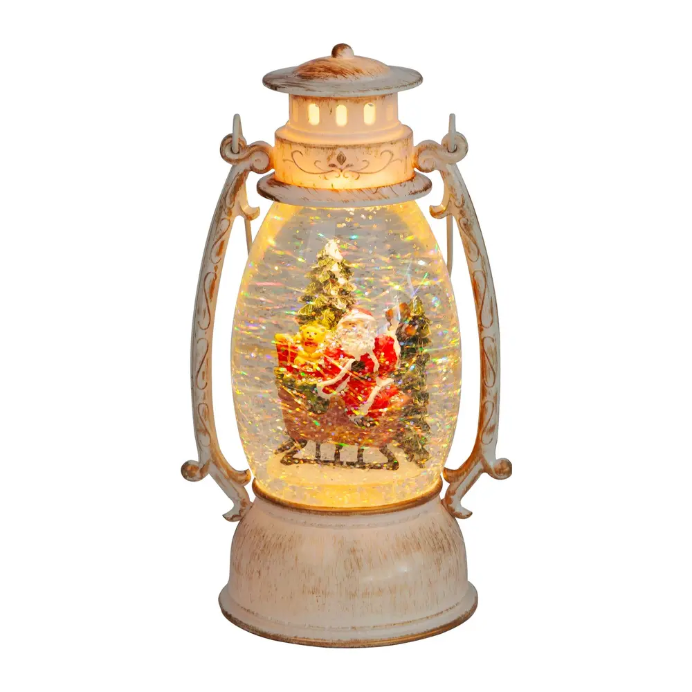 Vytvorte si kúzelnú atmosféru počas sviatkov s retro Lampášom MagicHome Vianoce. Tento krásny dekoratívny kúsok s motívom Santu na saniach a plávajúcimi trblietkami oživí váš interiér jemným LED osvetlením v teplej bielej farbe.